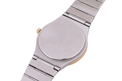 Lot 9 - A UNISEX MOVADO STAINLESS STEEL AND 18K YELLOW GOLD QUARTZ BRACELET WATCH