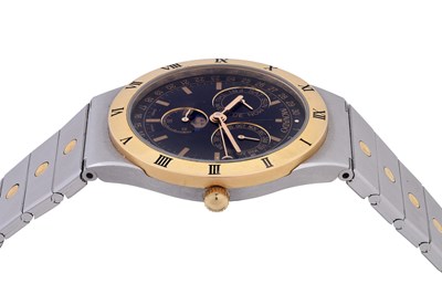 Lot 9 - A UNISEX MOVADO STAINLESS STEEL AND 18K YELLOW GOLD QUARTZ BRACELET WATCH