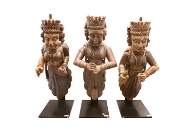 Lot 64 - THREE POLYCHROME-PAINTED CARVED WOODEN ARCHITECTURAL SUPPORT FIGURES