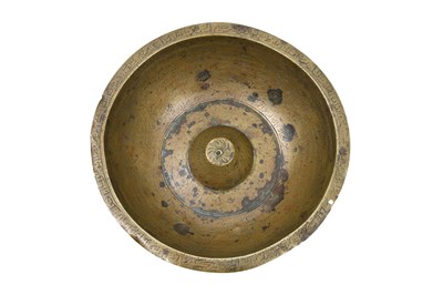 Lot 46 - AN ENGRAVED BRASS ‘MAGIC’ BOWL