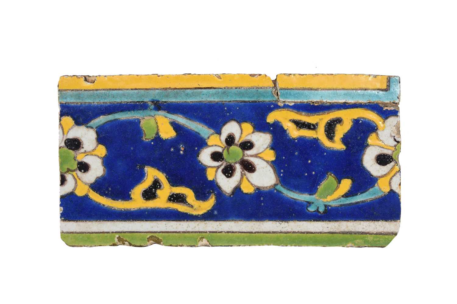 Lot 149 - A SAFAVID CUERDA SECA POTTERY BORDER TILE