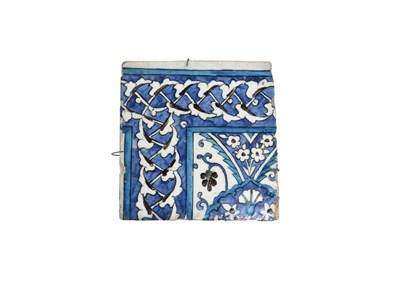 Lot 143 - AN OTTOMAN DAMASCUS POTTERY TILE WITH SPLIT PALMETTE SCROLLS