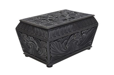 Lot 177 - A CARVED EBONY BATAVIAN CASKET WITH LOTUS FLOWERS