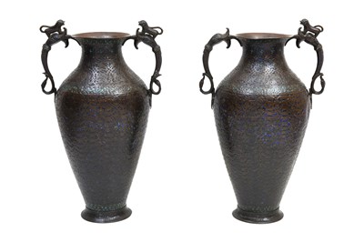 Lot 126 - A PAIR OF KASHMIRI CHAMPLEVÉ ENAMELLED BRASS VASES WITH PAIRS OF DRAGON HEADS AND LIONS