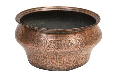 Lot 243 - A LARGE INCISED TINNED COPPER BASIN WITH ELABORATE VEGETAL MOTIFS