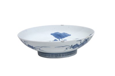 Lot 22 - A JAPANESE BLUE AND WHITE NABESHIMA ‘HIBISCUS’ DISH