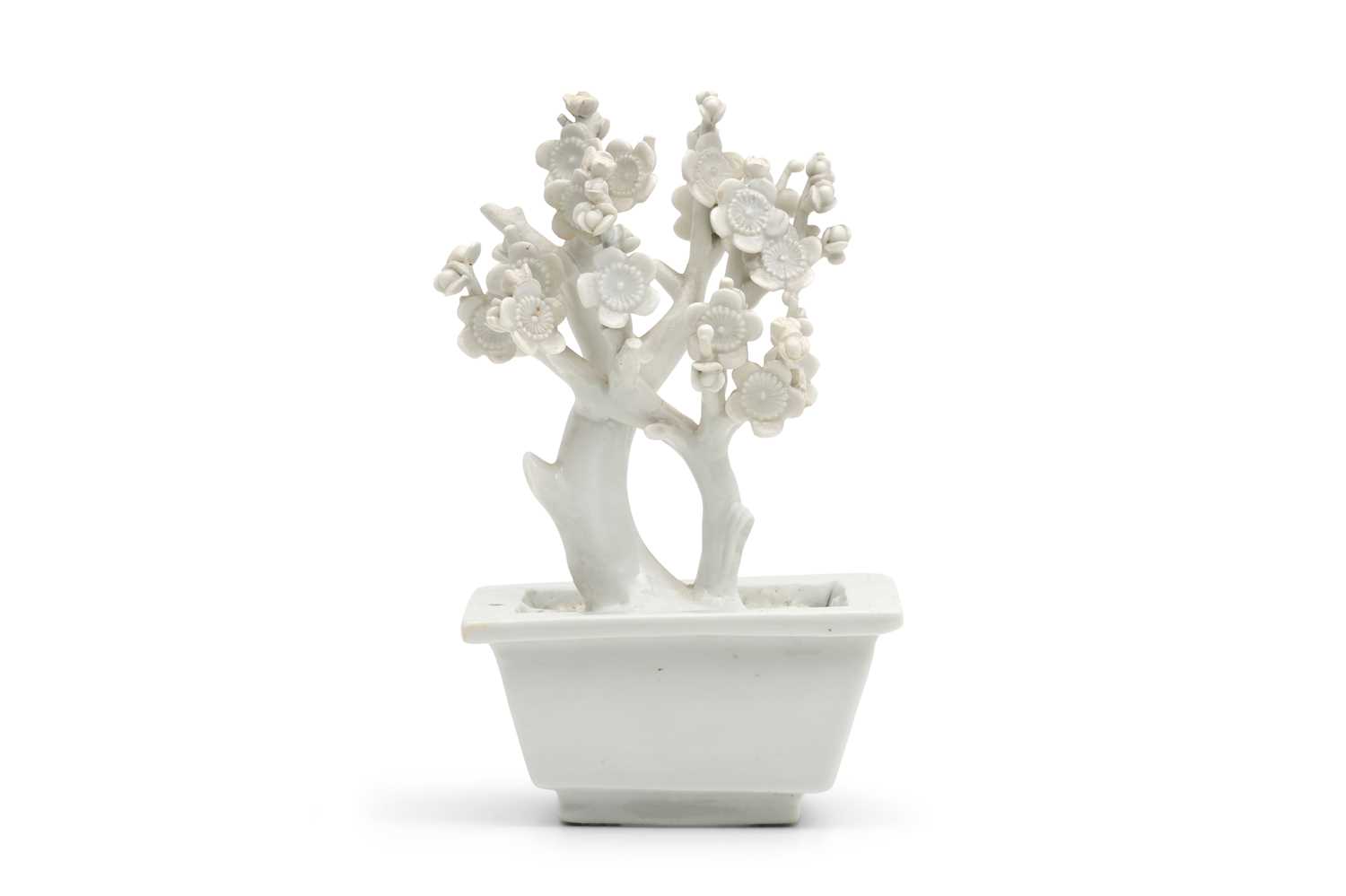 Lot 29 - A CHINESE BLANC DE CHINE MODEL OF A PRUNUS TREE