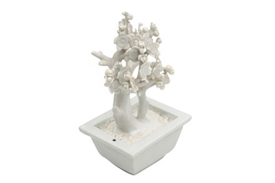 Lot 29 - A CHINESE BLANC DE CHINE MODEL OF A PRUNUS TREE
