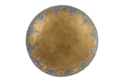 Lot 194 - A MAMLUK REVIVAL DAMASCUS-WARE COPPER AND SILVER-INLAID BRASS BOWL