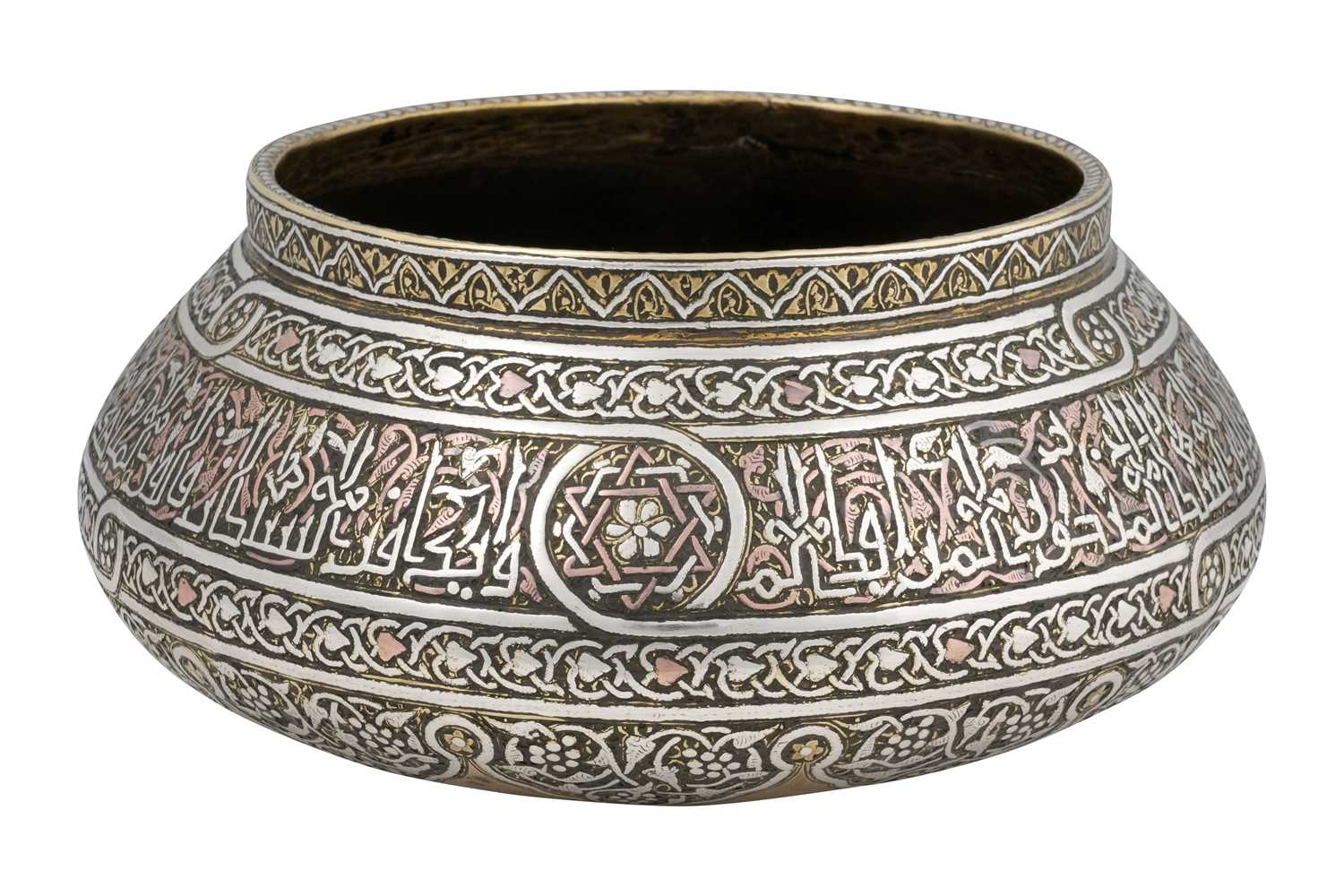 Lot 194 - A MAMLUK REVIVAL DAMASCUS-WARE COPPER AND SILVER-INLAID BRASS BOWL