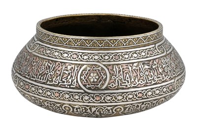 Lot 194 - A MAMLUK REVIVAL DAMASCUS-WARE COPPER AND SILVER-INLAID BRASS BOWL