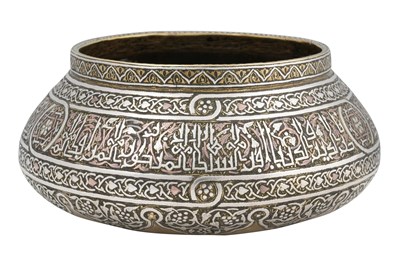 Lot 194 - A MAMLUK REVIVAL DAMASCUS-WARE COPPER AND SILVER-INLAID BRASS BOWL
