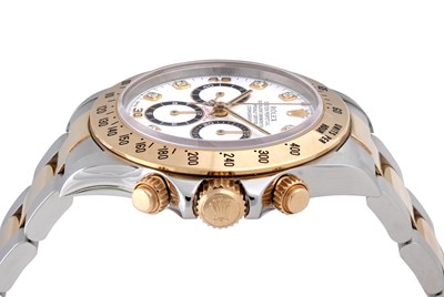 Lot 51 - A rare men's Rolex 18k yellow gold and stainless steel automatic chronograph bracelet watch.