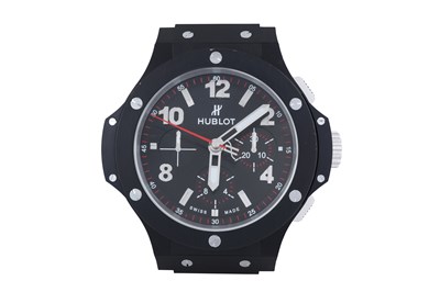 Lot 56 - HUBLOT BIG BANG BLACK WALL CLOCK.