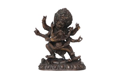 Lot 107 - A TIBETAN BRONZE FIGURE OF HERUKA AND VAJRAYOGINI