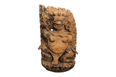 Lot 105 - A LARGE WOOD TIBETAN SCULPTURE OF A MAHAKALA
