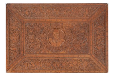 Lot 166 - A CARVED IRANIAN FRUITWOOD BOX WITH NASIR AL-DIN SHAH’S PORTRAIT