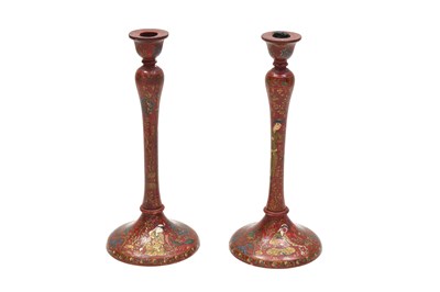 Lot 204 - A PAIR OF SAFAVID-REVIVAL IMAMI-STYLE LACQUERED WOODEN CANDLESTICKS