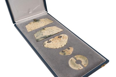 Lot 1 - A SET OF SIX CHINESE ARCHAIC TOMB JADES