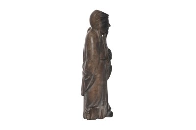 Lot 73 - A CHINESE SOAPSTONE FIGURE OF AN IMMORTAL