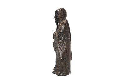 Lot 73 - A CHINESE SOAPSTONE FIGURE OF AN IMMORTAL
