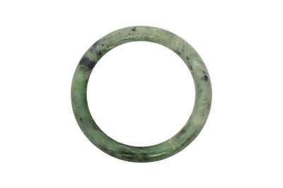Lot 69 - A CHINESE JADE BANGLE