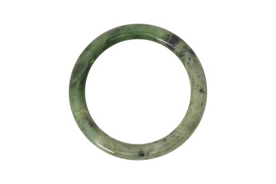 Lot 69 - A CHINESE JADE BANGLE