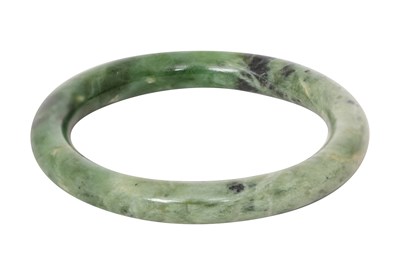 Lot 69 - A CHINESE JADE BANGLE
