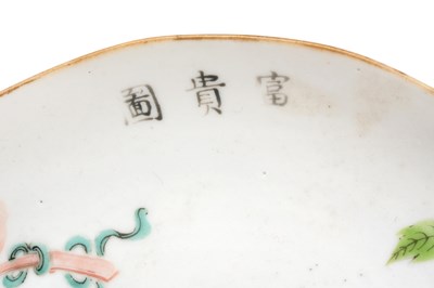Lot 51 - A CHINESE FAMILLE ROSE 'PEONY' DISH