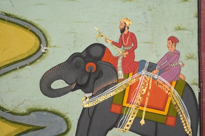 Lot 42 - A NOBLE RAJPUT FIGURE RIDING AN ELEPHANT ACROSS A RIVER