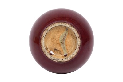 Lot 78 - A CHINESE RED-GLAZED BOTTLE VASE