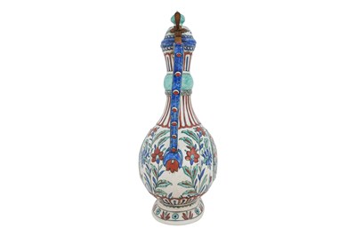 Lot 127 - A SAMSON IZNIK-STYLE POTTERY EWER WITH OTTOMAN JANISSARY AND ARCHITECTURE