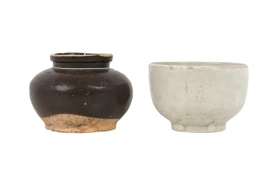 Lot 17 - A CHINESE WHITE-GLAZED SHUFU-STYLE BOWL AND A CIZHOU JAR