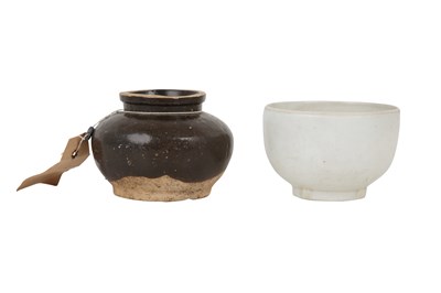 Lot 17 - A CHINESE WHITE-GLAZED SHUFU-STYLE BOWL AND A CIZHOU JAR