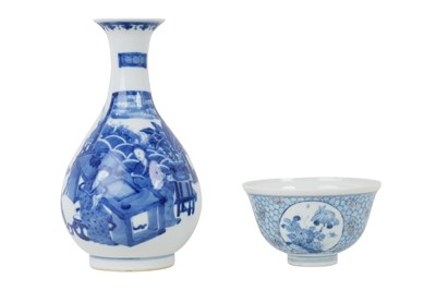 Lot 91 - A CHINESE BLUE AND WHITE BOTTLE VASE AND A BLUE AND WHITE AND UNDERGLAZE RED BOWL