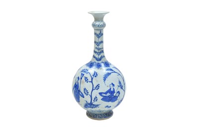 Lot 259 - A CHINESE PORCELAIN-INSPIRED QAJAR BLUE AND WHITE POTTERY BOTTLE