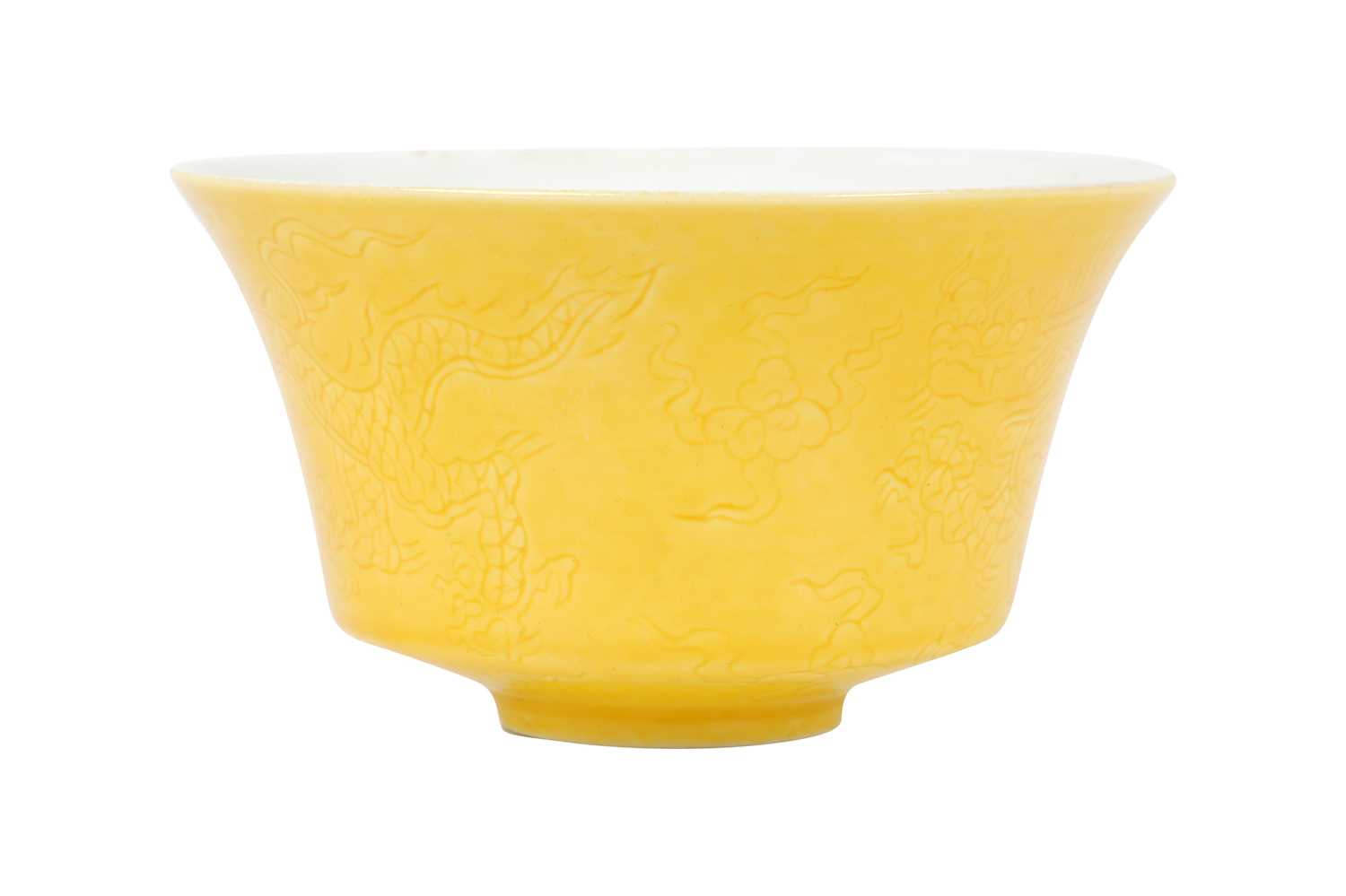 Lot 55 - A CHINESE LEMON YELLOW-GROUND 'DRAGON' BOWL