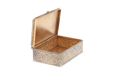 Lot 225 - A PRATAPGARH THEWA PARCEL-GILT SILVER BOX WITH STAINED GLASS AND FIGURAL GOLD LEAF DECORATION