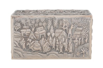 Lot 249 - A SILVER BURMESE REPOUSSÉ BOX WITH PROCESSION SCENE