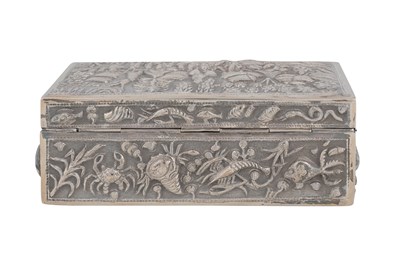 Lot 249 - A SILVER BURMESE REPOUSSÉ BOX WITH PROCESSION SCENE