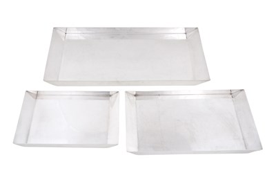 Lot 63 - THREE FRENCH CHRISTOFLE SILVER-PLATED GALLIA METAL RECTANGULAR TRAYS