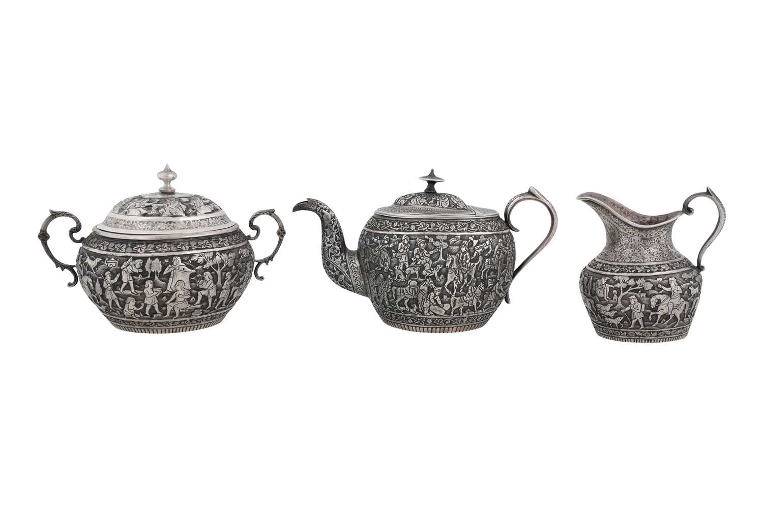 Lot 238 - AN UNMARKED IRANIAN (PERSIAN) THREE-PIECE SILVER TEA SET