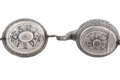 Lot 238 - AN UNMARKED IRANIAN (PERSIAN) THREE-PIECE SILVER TEA SET