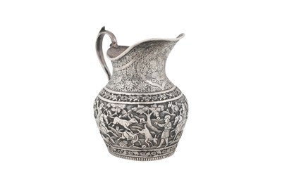Lot 238 - AN UNMARKED IRANIAN (PERSIAN) THREE-PIECE SILVER TEA SET