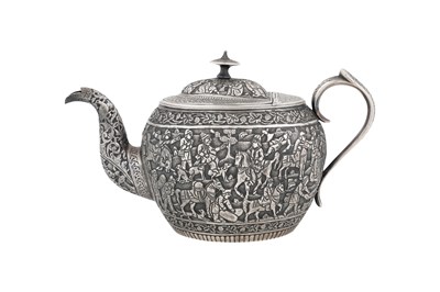 Lot 238 - AN UNMARKED IRANIAN (PERSIAN) THREE-PIECE SILVER TEA SET