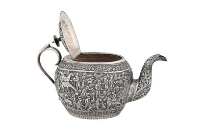 Lot 238 - AN UNMARKED IRANIAN (PERSIAN) THREE-PIECE SILVER TEA SET