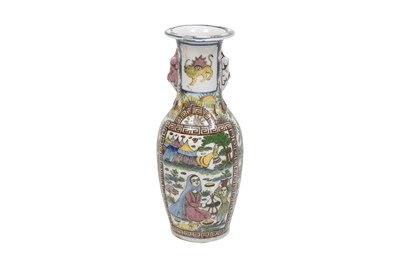 Lot 260 - A POLYCHROME-PAINTED MOULDED QAJAR POTTERY VASE WITH VILLAGE SCENES