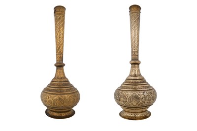 Lot 183 - A PAIR OF ZAND-STYLE QAJAR MONUMENTAL BRASS VASES