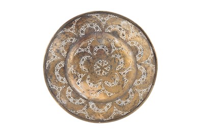 Lot 200 - A QAJAR OPENWORK SILVER-INLAID BRASS DISH