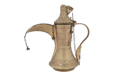 Lot 217 - A NAZWA STYLE QURAYSHIA TRIBE BRASS DALLAH COFFEE POT